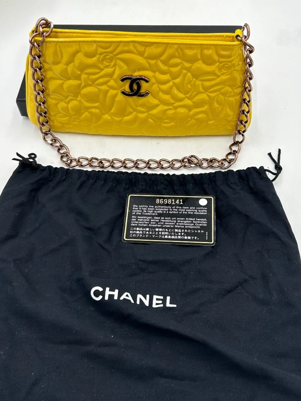 Women’s Chanel Patent Camellia Pochette. Made in Italy.